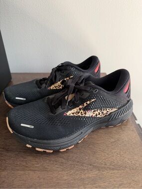 Brooks Black Running Shoes with Leopard Accent and Coral Highlights